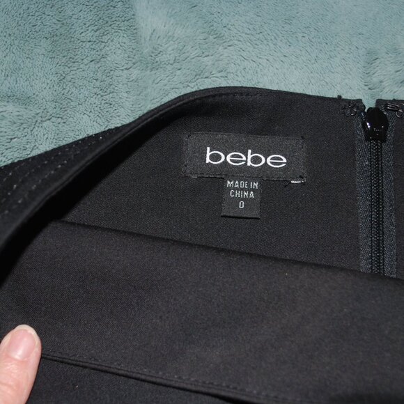 ๐ Elevate Your Wardrobe with a Classic Black bebe Mini Skirt! ๐ - Picture 3 of 10